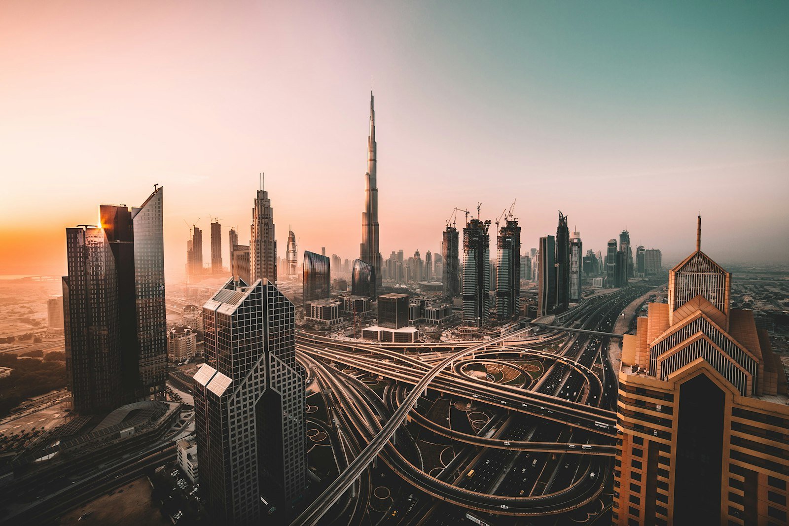 Burj Khalifa and the Downtown Dubai skyline at sunrise