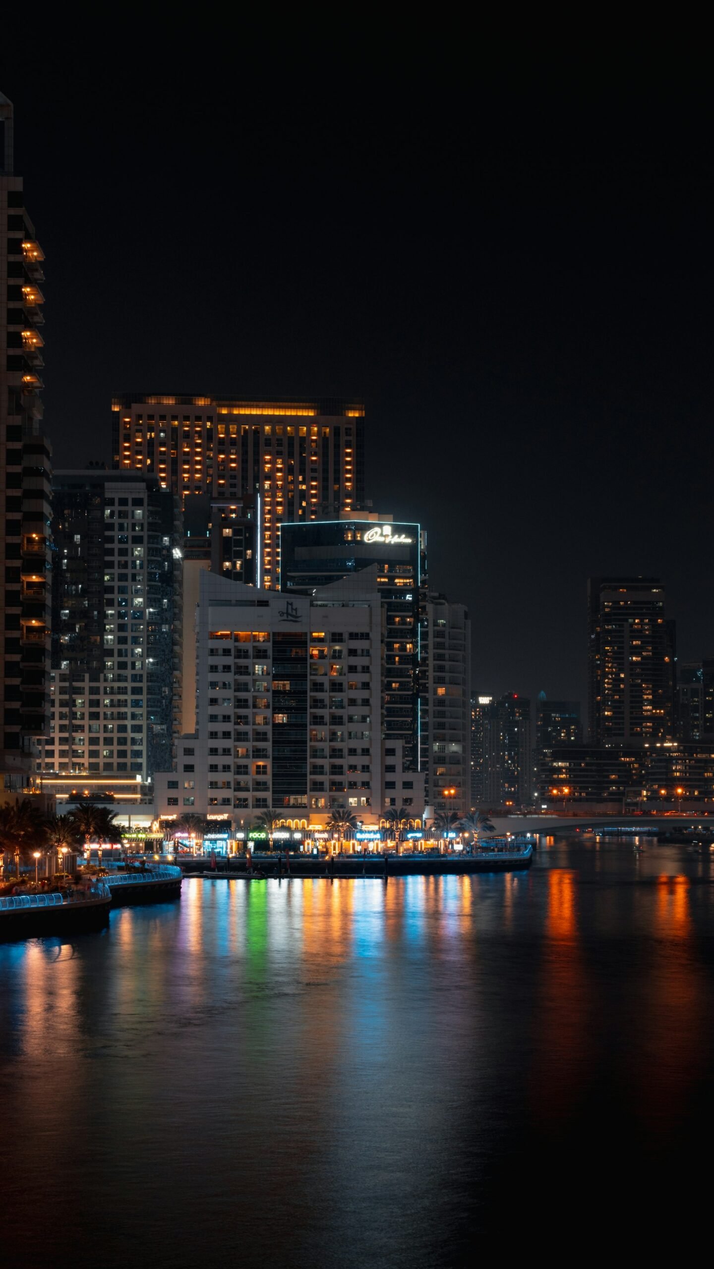 Dubai Marina waterfront and promenade at night