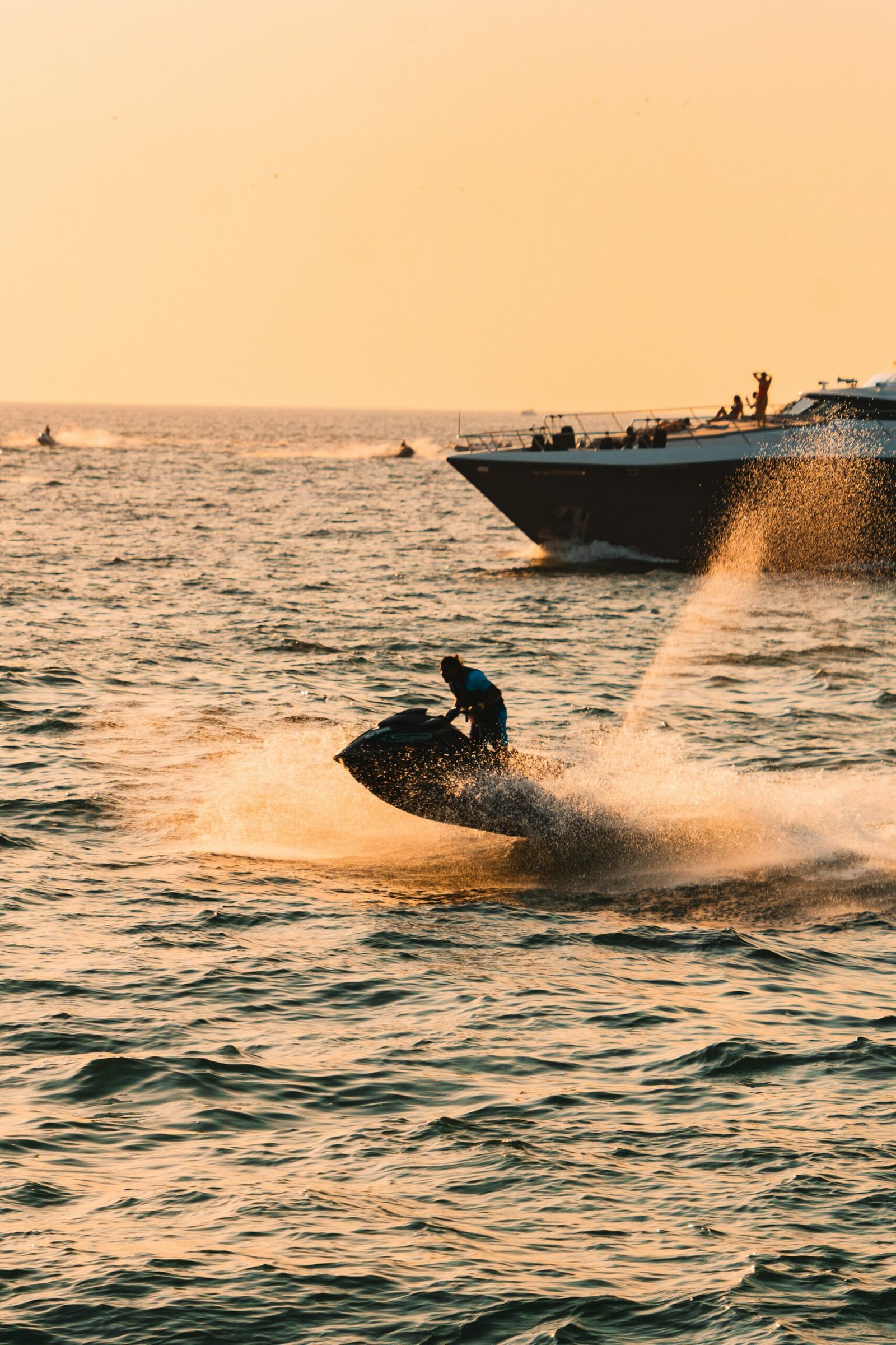 Jet ski riding at sunset off the Dubai coast